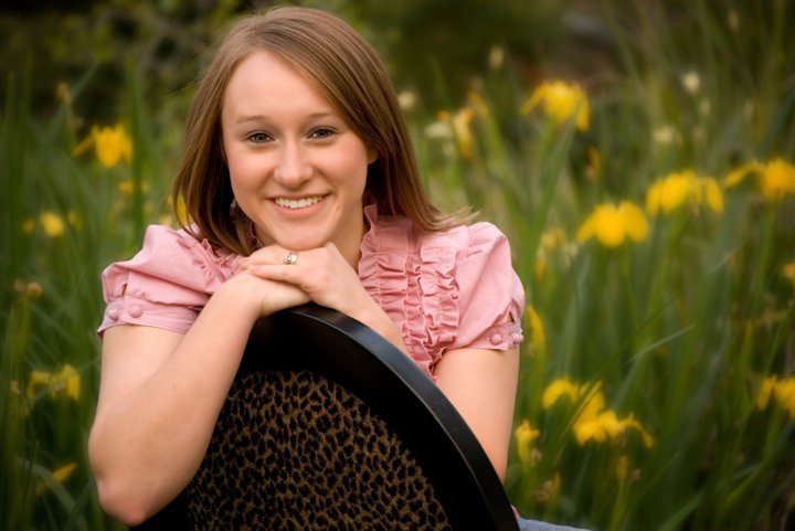 girl on back of chair
